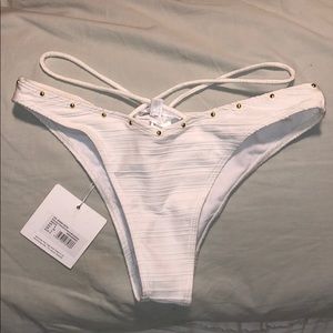 White strappy bikini bottoms with gold studs